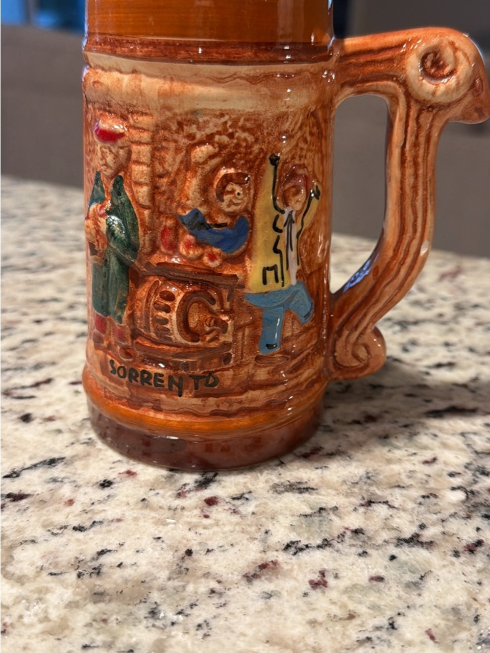 Handcrafted Brown Ceramic Stein with Raised Village Scene